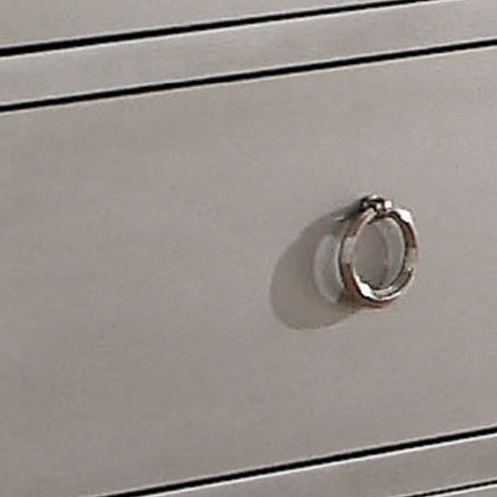 Cómoda triple de siete cajones de madera maciza y manufacturada color platino de 57"