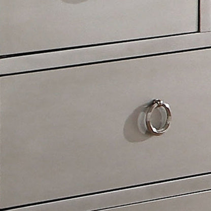 Cómoda triple de siete cajones de madera maciza y manufacturada color platino de 57"