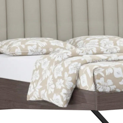 Estructura de cama Queen tapizada en piel sintética gris y brillo marfil