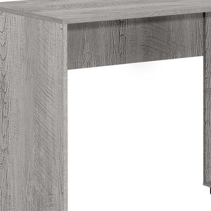 Escritorio para computadora en forma de L de madera gris de 46"