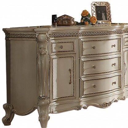 Cómoda triple de cinco cajones de madera maciza y manufacturada color perla de 69"