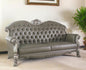 96" Bone Faux Leather Sofa And Toss Pillows With White Legs