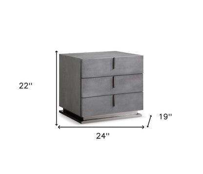 Mesita de noche de tres cajones de madera maciza y manufacturada de 22" en color gris