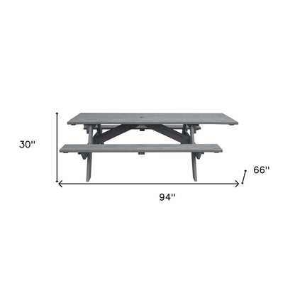 Mesa de picnic al aire libre de madera maciza gris con agujero para sombrilla