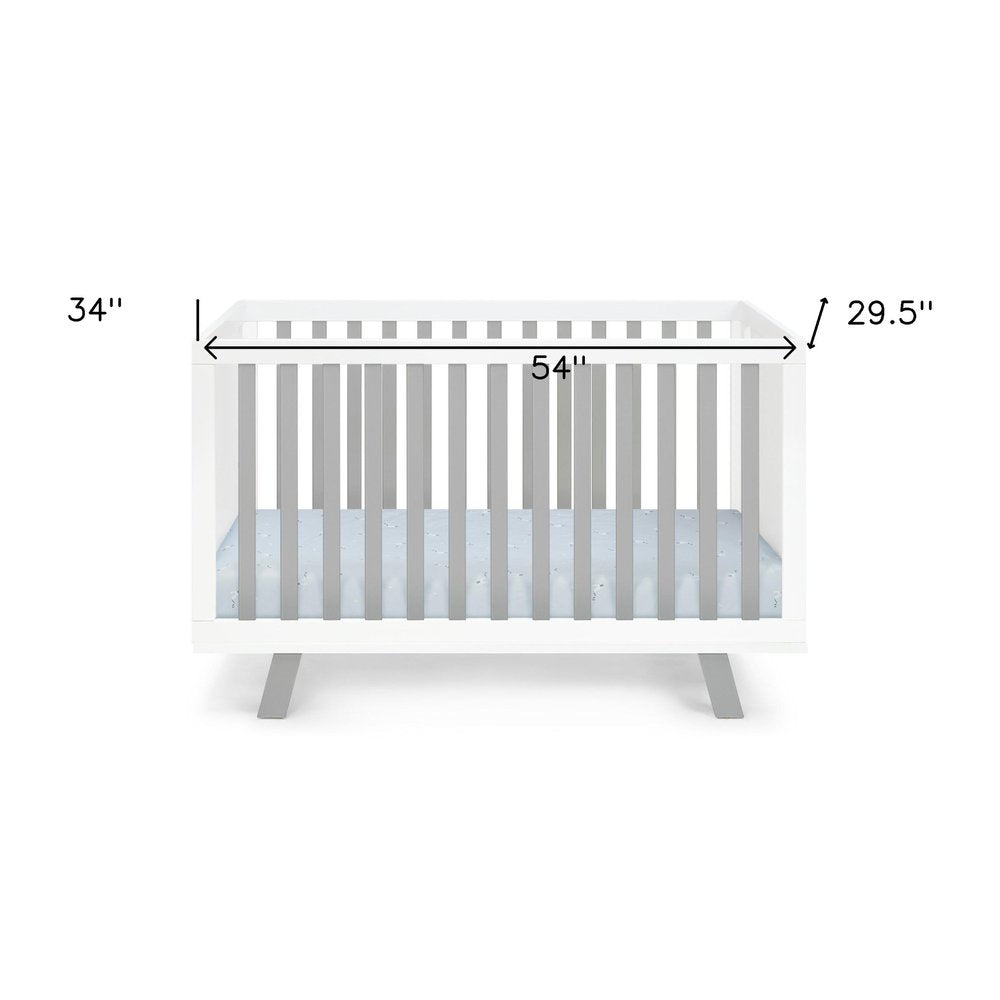 Cuna convertible tres en uno estándar de madera maciza y manufacturada en gris y blanco