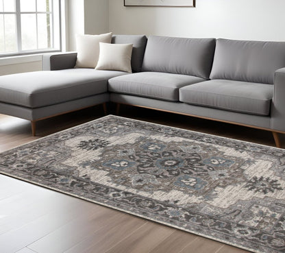 9' X 12' Ivory Taupe and Gray Medallion Power Loom Area Rug