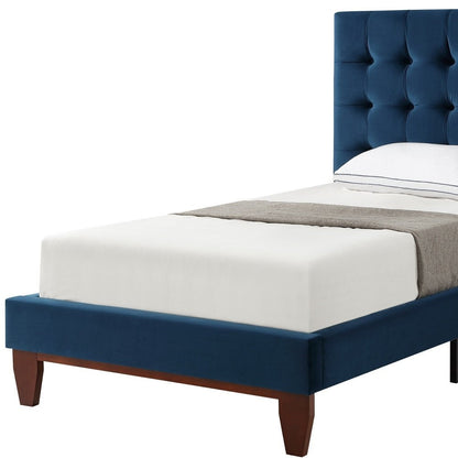 Cama individual de madera maciza azul marino con tapizado de terciopelo capitoné