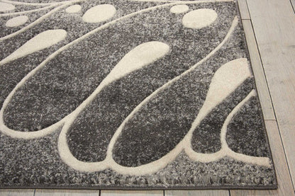 9' X 13' Ivory Black and Gray Botanical Leaves Non Skid Area Rug