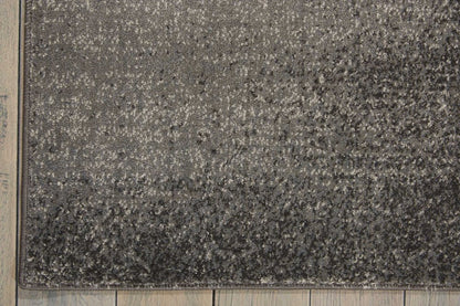 9' X 13' Ivory Black and Gray Botanical Leaves Non Skid Area Rug