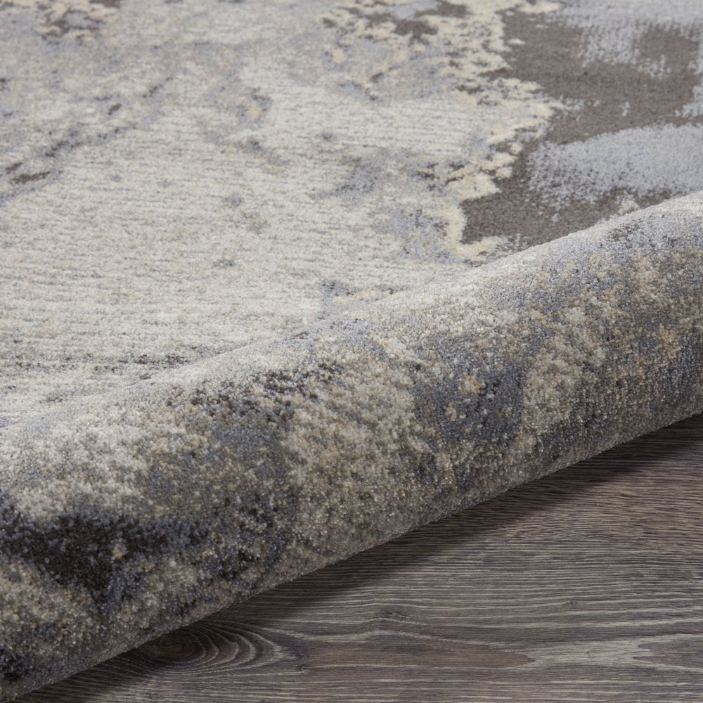 9' X 13' Gray Black and Ivory Abstract Area Rug