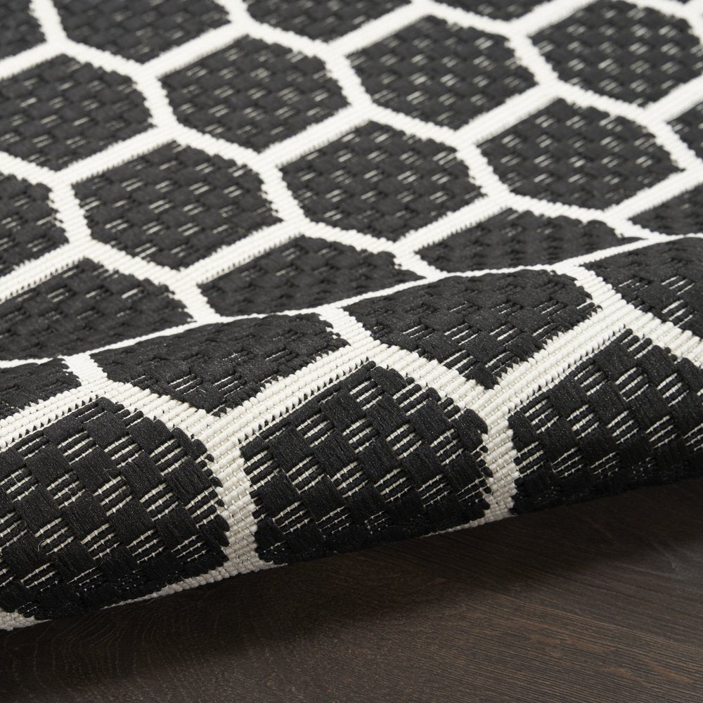 10' Black And Ivory Geometric Indoor Outdoor Runner Rug