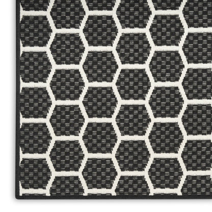 10' Black And Ivory Geometric Indoor Outdoor Runner Rug