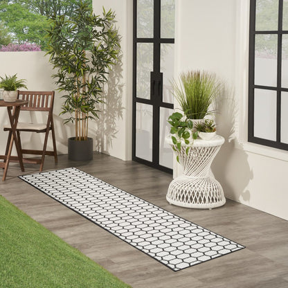 10' Black And Ivory Geometric Indoor Outdoor Runner Rug