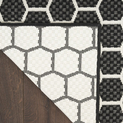 10' Black And Ivory Geometric Indoor Outdoor Runner Rug