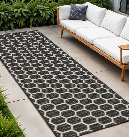 10' Black And Ivory Geometric Indoor Outdoor Runner Rug