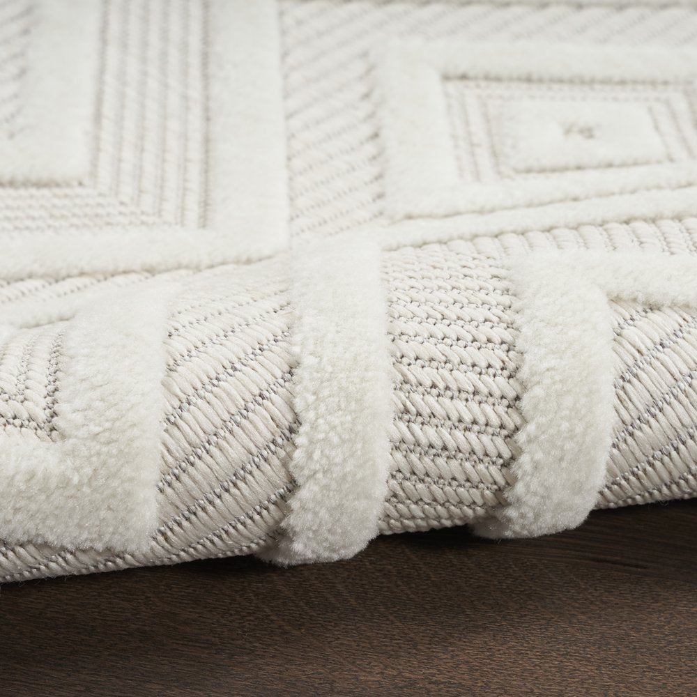 10' Ivory And White Geometric Indoor Outdoor Runner Rug