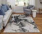 9' X 12' Ivory Black and Taupe Abstract Power Loom Area Rug