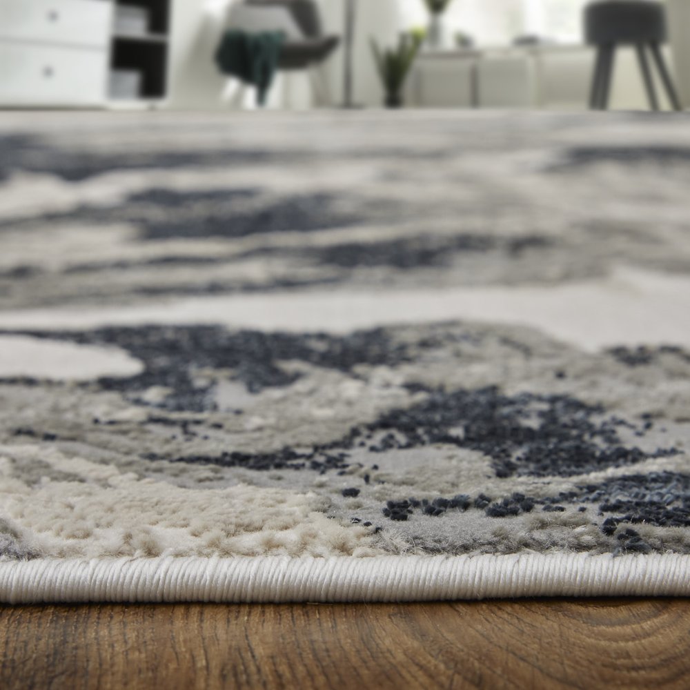 9' X 12' Ivory Black and Taupe Abstract Power Loom Area Rug