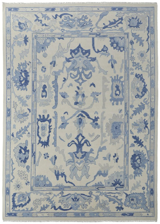 9' X 13' Ivory and Blue Wool Floral Hand Knotted Area Rug With Fringe