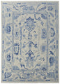 9' X 13' Ivory and Blue Wool Floral Hand Knotted Area Rug With Fringe