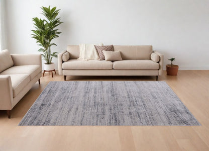 9' X 13' Gray Ivory And Taupe Area Rug
