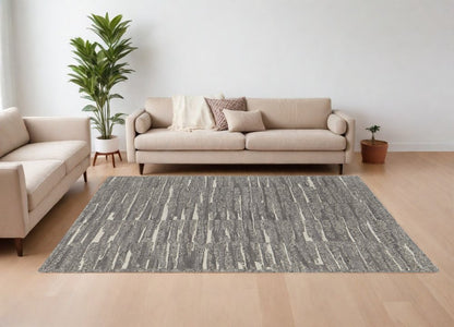 9' X 13' Gray Ivory and Taupe Abstract Hand Woven Area Rug