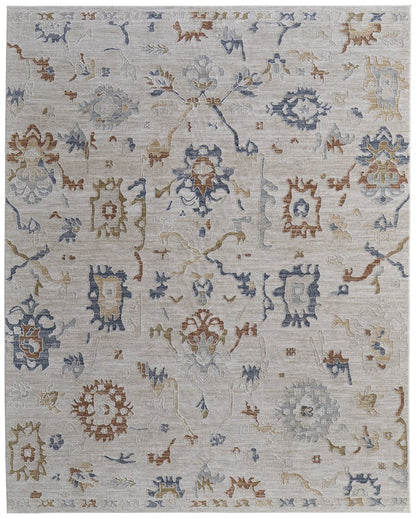 9' X 13' Ivory Blue and Gold Floral Power Loom Worn Faded Area Rug With Fringe