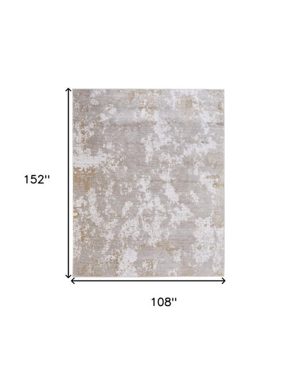 9' X 13' Gray Brown and Ivory Abstract Power Loom Area Rug