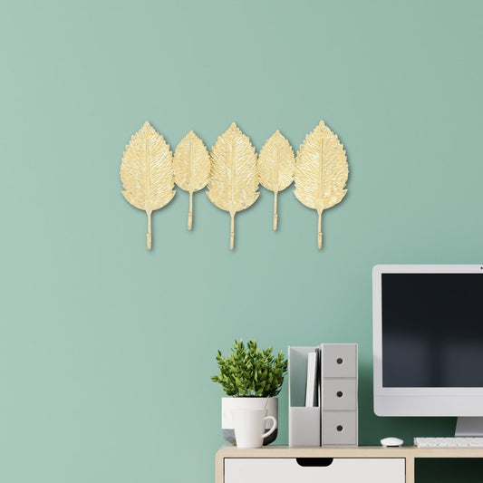 Perchero de pared de aluminio dorado de 18" con cinco ganchos y diseño de hojas