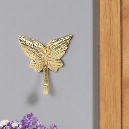 Gancho de pared de mariposa de hierro fundido dorado de 5"