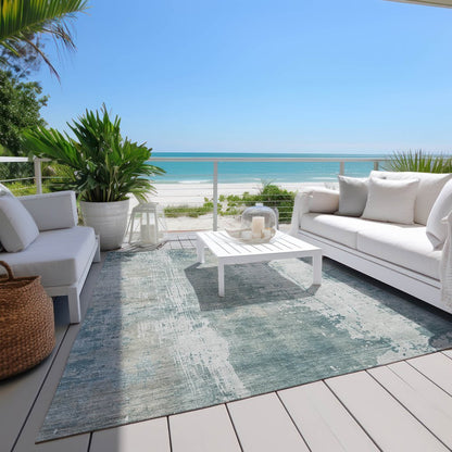 9' X 12' Turquoise And Ivory Abstract Washable Indoor Outdoor Area Rug