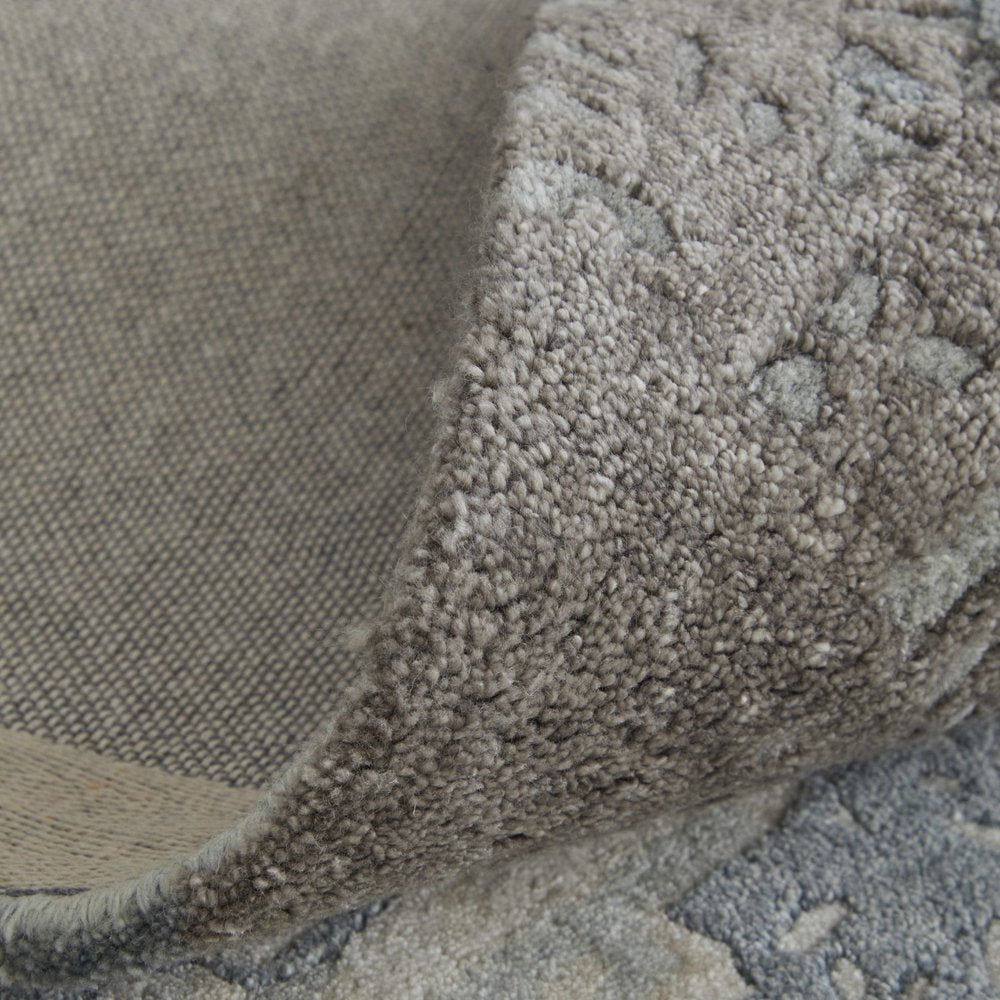 9' X 12' Ivory Taupe And Green Abstract Hand Tufted Distressed Area Rug
