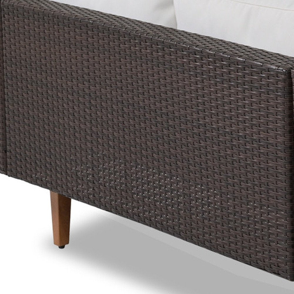 Two Piece Outdoor Beige Wicker Sectional Seating Group with Beige Cushions