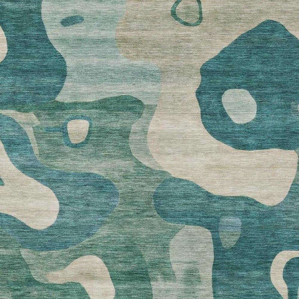 9' X 12' Teal Blue Ivory And Beige Abstract Washable Indoor Outdoor Area Rug