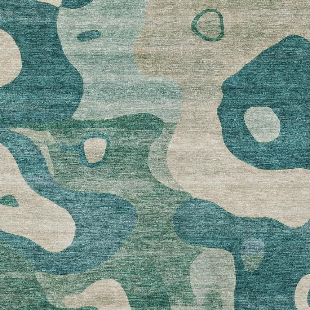 9' X 12' Teal Blue Ivory And Beige Abstract Washable Indoor Outdoor Area Rug