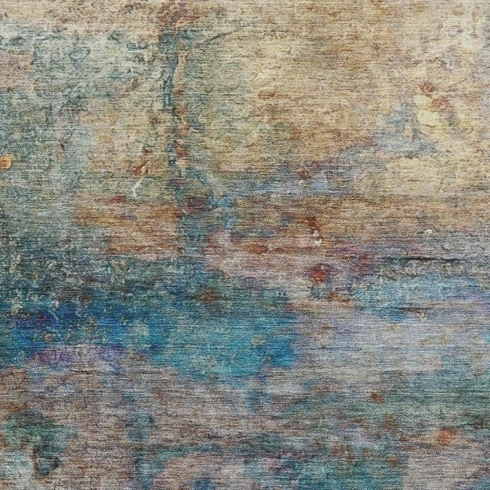 9' X 12' Teal Blue Orange And Beige Abstract Washable Indoor Outdoor Area Rug