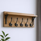 Perchero de pared de 6" con cinco ganchos de metal y madera maciza, color negro y marrón