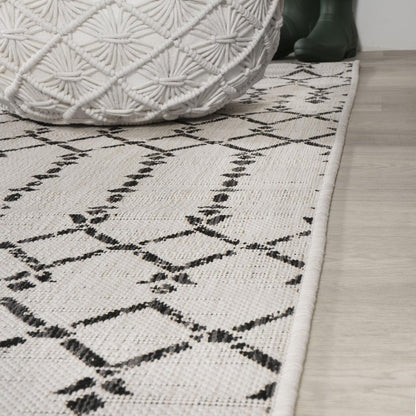 10' Cream And Black Trellis Indoor Outdoor Runner Rug