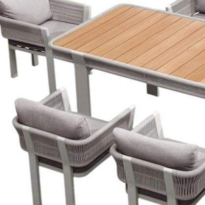 Nine Piece Light Brown and Beige Solid Wood Dining Set with Eight Chairs