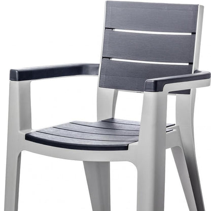 Nine Piece Gray Plastic Outdoor Patio Set With Table
