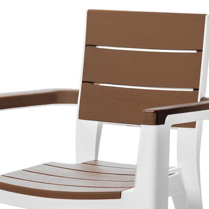 Nine Piece Brown Plastic Outdoor Patio Set With Table